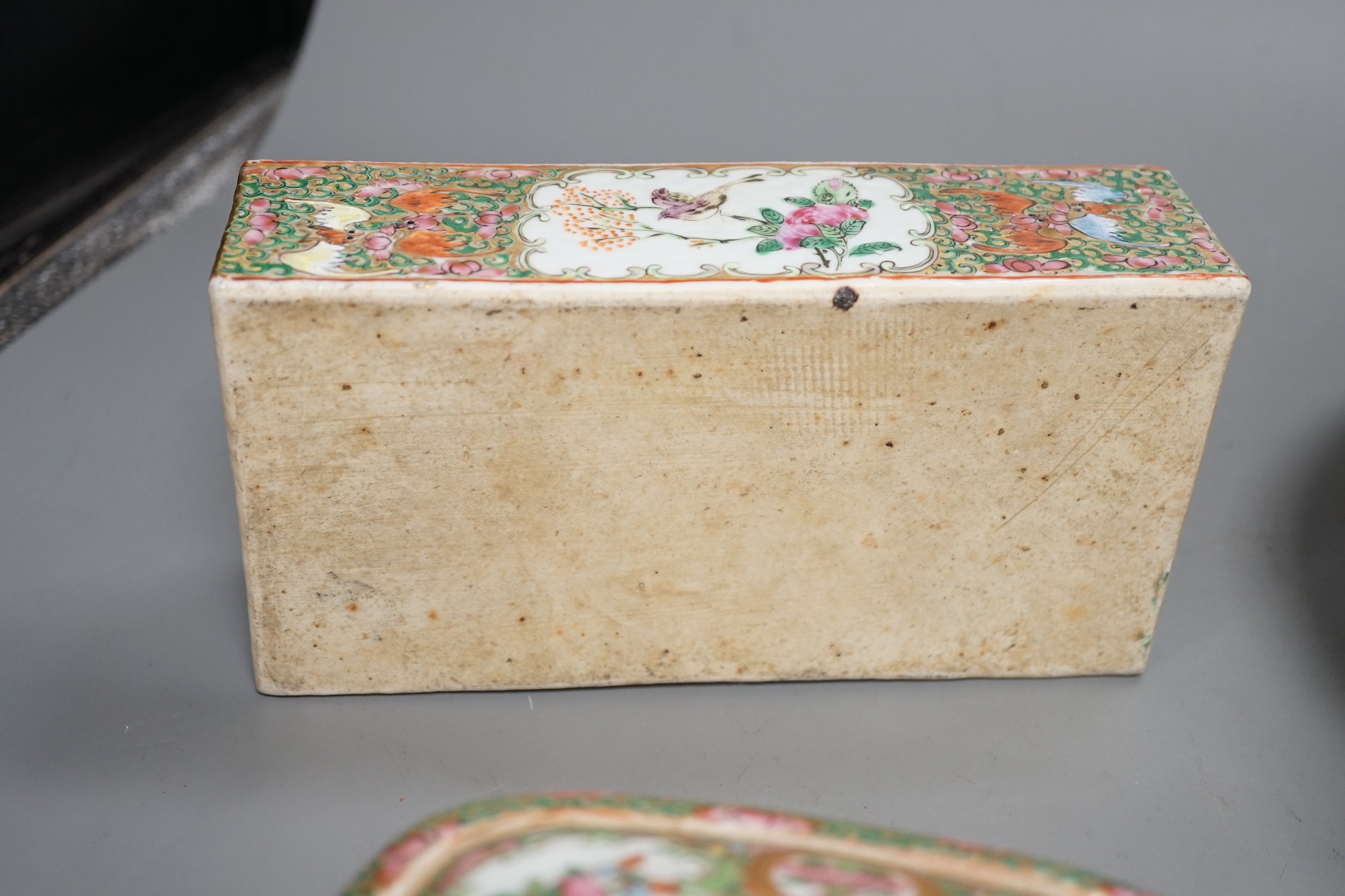 A group of 19th century Chinese famille rose porcelain - two soap dishes, strainers and covers, a plate and a pen box base